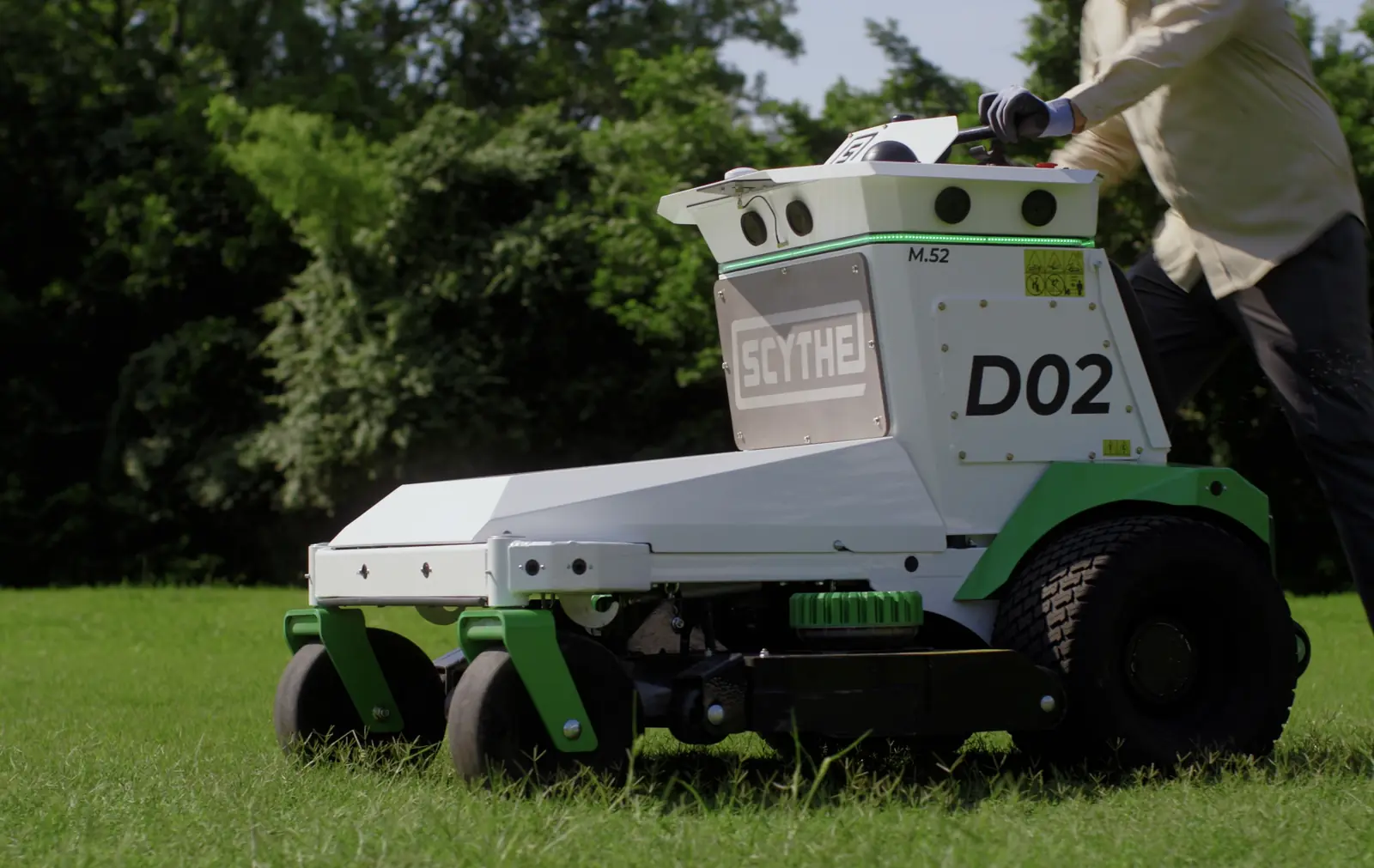 Operator standing beside M.52 on a lawn