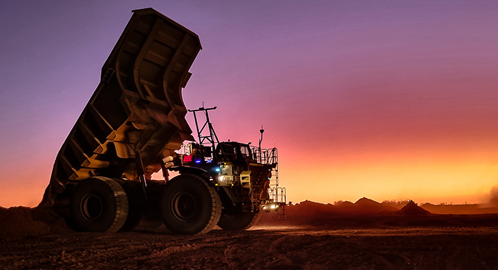 image of an ASI equipped haul truck at sunset